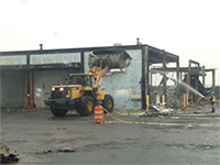 January 2015 - Removing the west wall in the northeast corner of the Waste Management garage