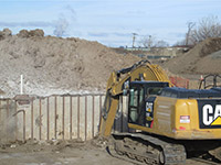 January 2016 - Removing portion of former trash pit walls