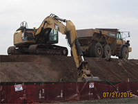 July 2015 - Fine grading of soils along slope at Kellogg St. properties