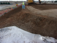 July 2015 - Fine grading of soil at Kellogg St. properties