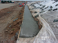July 2015 - Finishing the concrete barrier wall