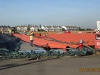 July 2016 - Placing geocomposite drainage layer panel