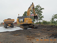 June 2015 - Loading end dump on plastic at former Jersey City property