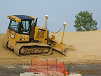 June 2016 - Grading clean imported cover soils in open space area