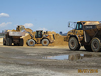 June 2016 - Loading clean imported cover soils for placement in open space area