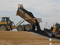 June 2016 - Placing clean imported topsoil in open space area on Kellogg Street properties