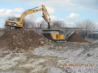 March 2014 - Contractor crushes concrete debris