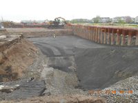 May 2014 - Backfill material is placed in the excavation