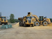 May 2016 - Loading imported cover soils for placement in open space area