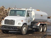 November 2013 - Dust Control Utilizing Water Trucks