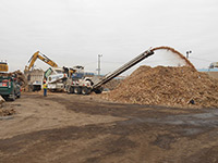 November 2013 - Wooden debris is ground up for disposal