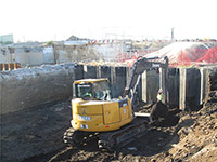 October 2015 - Excavating near sheeting with small back hoe