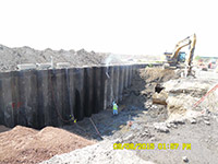 September 2015 - Cleaning barrier wall prior to backfill